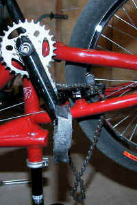 chain_removed_from_rear_sprocket_and_hanging.jpg (42676 bytes)